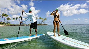 couple on stand up paddleboard